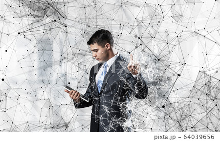 Business person pointing on abstract network 64039656