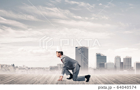 King businessman in elegant suit running and modern cityscape at King businessman in elegant suit running and modern cityscape at 64040574