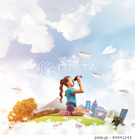 Concept of careless happy childhood with girl looking in future 64041243