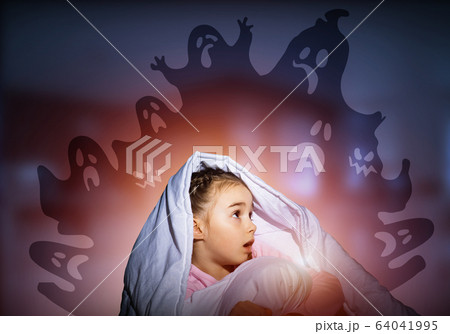 Excited girl hiding under blanket 64041995