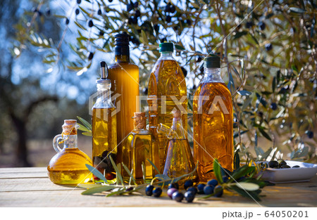 Olive oil in glass decanters and bottles Olive oil in glass decanters and bottles 64050201