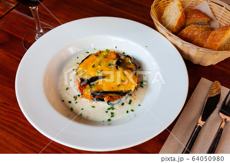Moussaka from aubergine and tuna Moussaka from aubergine and tuna 64050980
