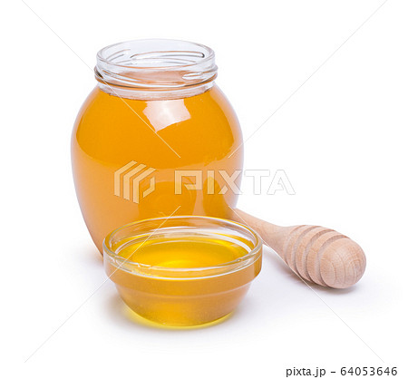 honey dipper and honey in jar on white background honey dipper and honey in jar on white background 64053646