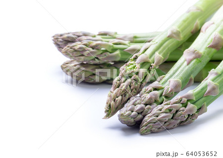 Fresh green asparagus on white 64053652
