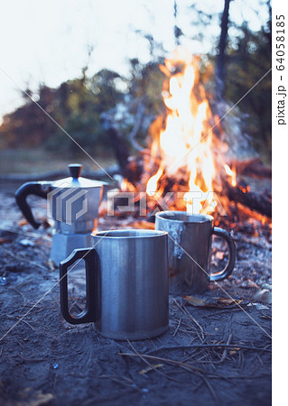 bonfire and geyser coffee maker in the foreground bonfire and geyser coffee maker in the foreground 64058185