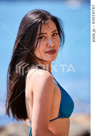 Close-Up portrait of beautiful asian girl in a 64059787