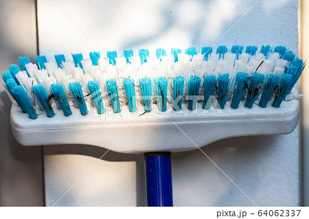 Dirty broom for cleaning Floor,  Close up & Macro shot, Selective focus 64062337
