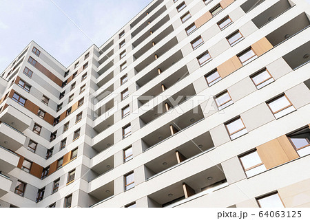 Modern new home with beautiful facade painting, exterior shot. Europe Modern new home with beautiful facade painting, exterior shot. Europe 64063125