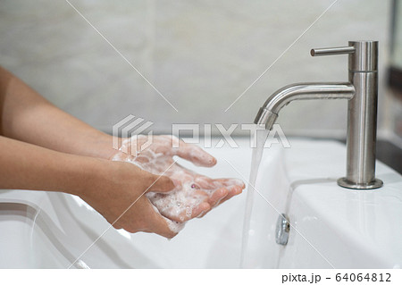 Washing hands rubbing with soap proper technique Washing hands rubbing with soap proper technique 64064812