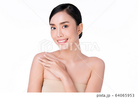 Beautiful Young Asian Woman with Clean Fresh Skin. Face care, Facial treatment, Cosmetology, beauty Beautiful Young Asian Woman with Clean Fresh Skin. Face care, Facial treatment, Cosmetology, beauty 64065953