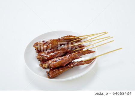 Thai food with grilled chicken wings on white Thai food with grilled chicken wings on white 64068434