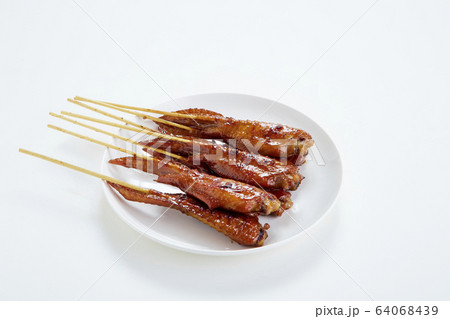 Thai food with grilled chicken wings on white 64068439
