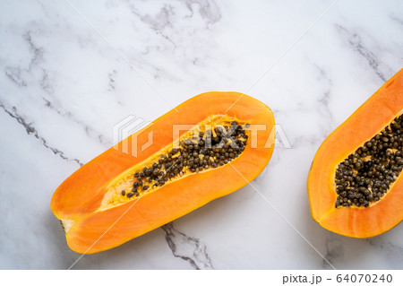 Ripe papaya on white background 64070240