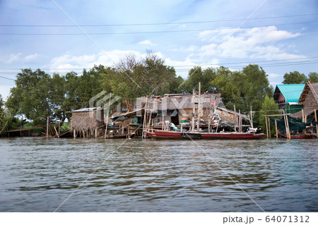 floating house and boat on the river in asian 64071312