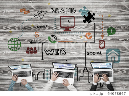 Top view of businesspeople sitting at table and using gadgets Top view of businesspeople sitting at table and using gadgets 64078647