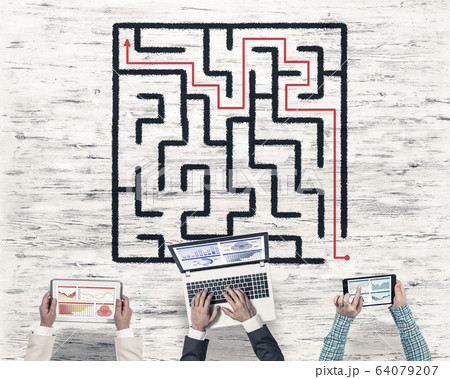 Top view of businesspeople sitting at table and using gadgets 64079207