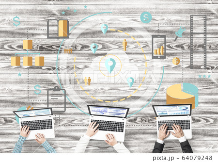 Top view of businesspeople sitting at table and using gadgets 64079248