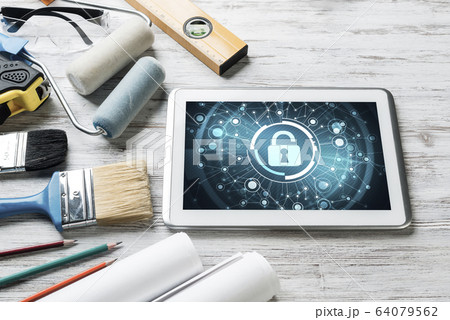 Web security and technology concept with tablet pc on wooden tab 64079562