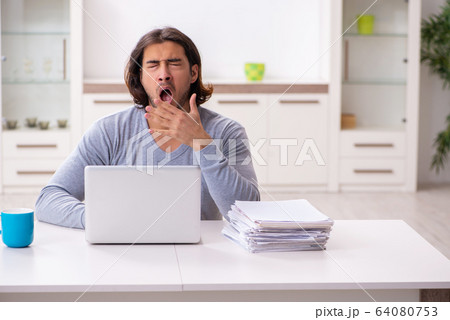 Young male employee freelancer working from home 64080753