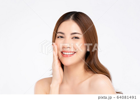 Smiling Asian woman with fair skin hand touching Smiling Asian woman with fair skin hand touching 64081491
