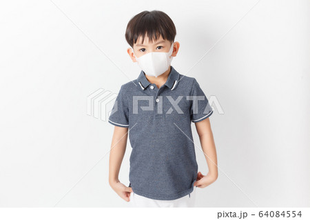 Asian boy wearing a protection mask Asian boy wearing a protection mask 64084554