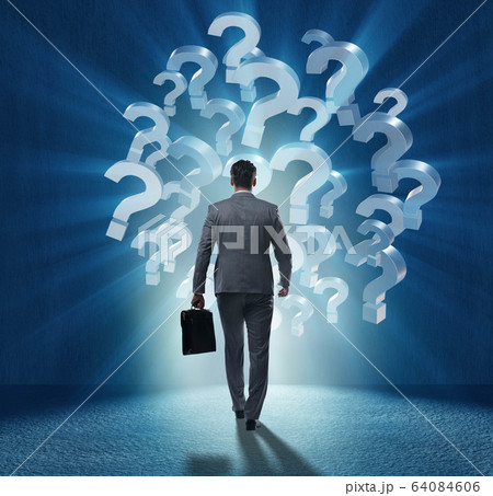 Businessman in uncertainty concept with question marks Businessman in uncertainty concept with question marks 64084606