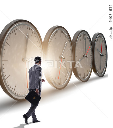Businessman in time management concept Businessman in time management concept 64084632