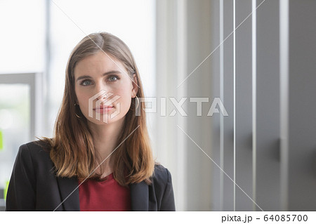 Businesswoman in suit smile by confident.. 64085700