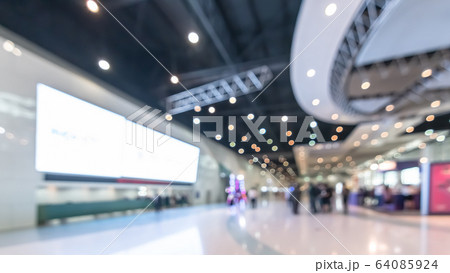 Exhibition event convention hall business blur background of tech expo, trade fair, passenger terminal or museum gallery lobby with blurry interior large corridor hallway white room empty space Exhibition event convention hall business blur background of tech expo, trade fair, passenger terminal or museum gallery lobby with blurry interior large corridor hallway white room empty space 64085924