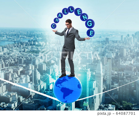 Businessman walking tight rop in challenge concept Businessman walking tight rop in challenge concept 64087701