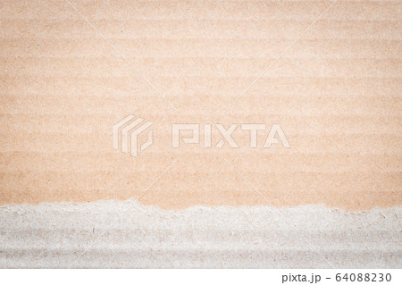 Torn Brown color cardboard paper detail texture patterned background 64088230
