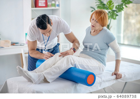 Nice senior woman having her treatment session 64089738