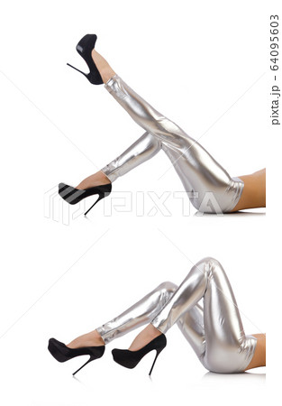 Woman legs with stockings on white 64095603