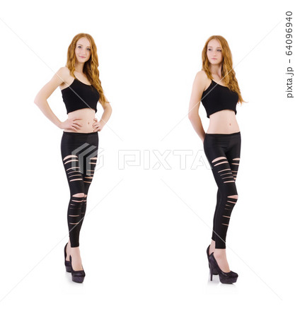 Girl with torn leggings on white 64096940