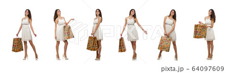 Woman with shopping bags isolated on white 64097609