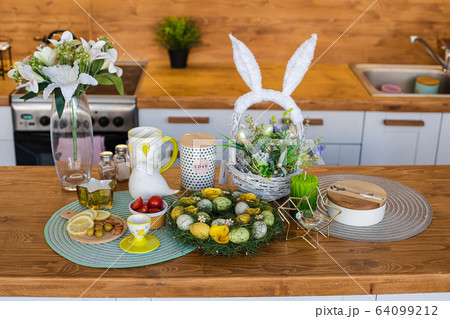 Lovely still life of Easter decorations. wooden Lovely still life of Easter decorations. wooden 64099212