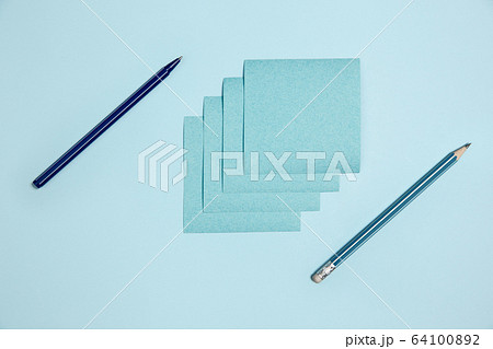 Sticker paper. Monochrome stylish composition in blue color. Top view, flat lay. 64100892
