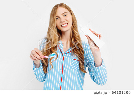 Portrait of a cute beautiful girl in pajamas and Portrait of a cute beautiful girl in pajamas and 64101206