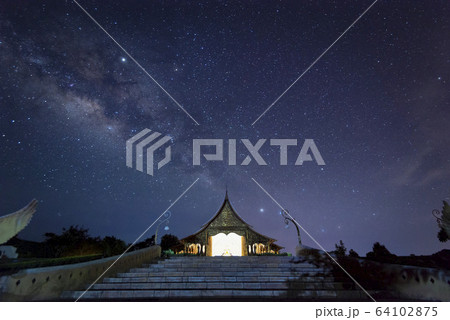 Night View of Wat Sirindhorn Wararam Phu Prao, Glow in the Dark Temple under the Milky Way, Ubon Ratchathani, Thailand Night View of Wat Sirindhorn Wararam Phu Prao, Glow in the Dark Temple under the Milky Way, Ubon Ratchathani, Thailand 64102875