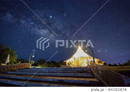 Night View of Wat Sirindhorn Wararam Phu Prao, Glow in the Dark Temple under the Milky Way, Ubon Ratchathani, Thailand 64102876