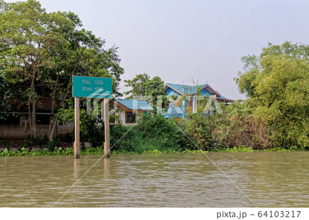 Traditional Thai house by the water Traditional Thai house by the water 64103217