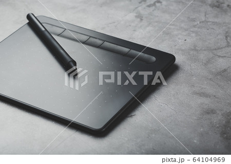 Graphic tablet with a pen on a gray background, Graphic tablet with a pen on a gray background, 64104969