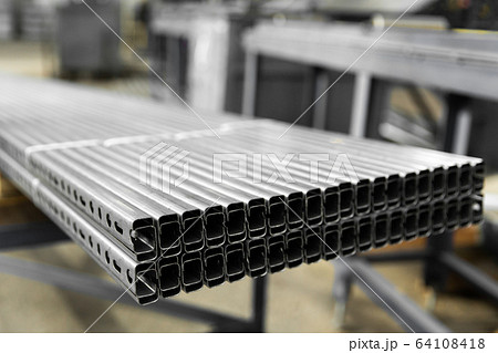 Bent metal profile channel. Zinc steel profile at bundle. 64108418
