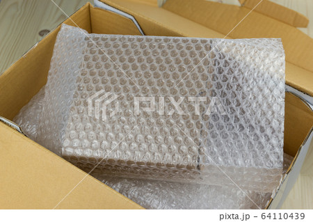 Bubbles covering the box by bubble wrap for protection product cracked  or insurance During transit  64110439