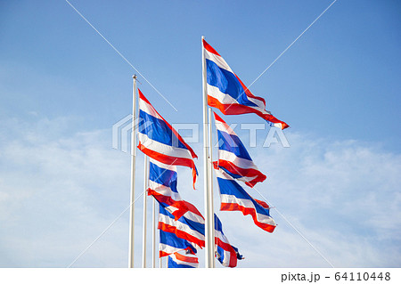 The National Flag Of Thailand with blue sky background 64110448