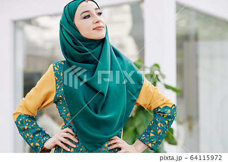 Proud muslim young woman 64115972