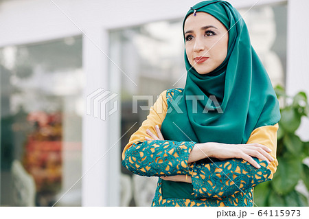 Confident determined muslim woman 64115973