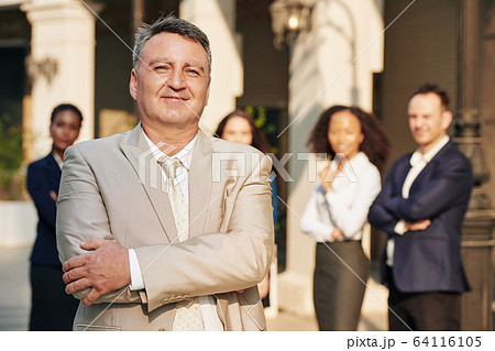 Confident mature entrepreneur Confident mature entrepreneur 64116105