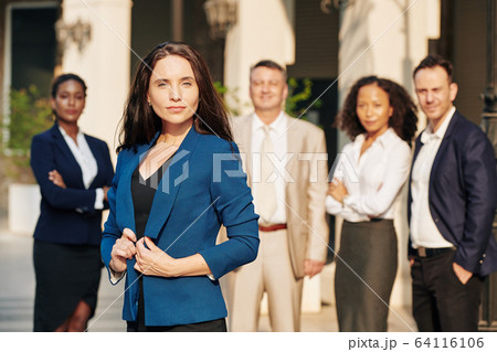 Young serious businesswoman Young serious businesswoman 64116106