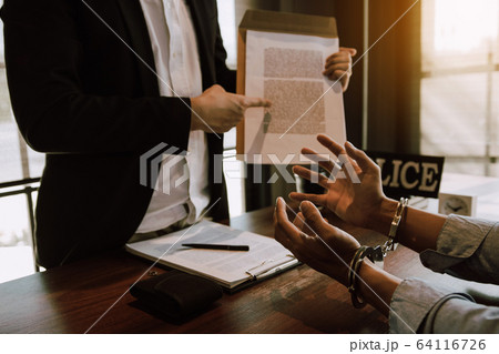 The police officer pointed to the document 64116726